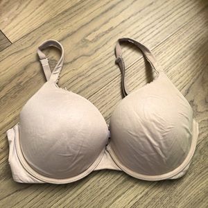 Victoria’s Secret body by Victoria. 34D nude. Underwire.  Lightly padded.